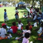 Children enjoy the parcels handed out to them by HelpingSA