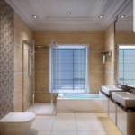 bath with double hand basins and toilet in sand coloured room