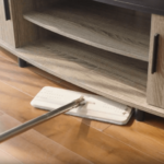 low profile Vertex mop head sliding under low shelf on wooden floor