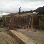 Roofing rafters being installed on a building in Durban by Nazareth