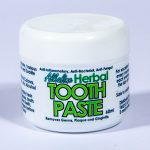 Tub of organic herbal tooth paste