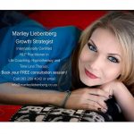 headshot of life coachblonde Mariley Liebenberg who has blue eyes wearing a blue shirt.