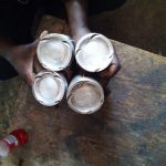 four silver metal round discs that go onto a truck's engine