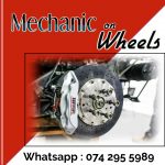 poster with red and white background has picture of a car wheel and its drum to advertise mechanic on wheels in Durban