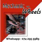 Poster in red and white with man's hands working on a car engine to advertise Mechanic on Wheels in Durban North