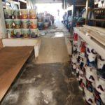 Rows of paint and varnish on shelves inside the hardware Maclear shop in KZN