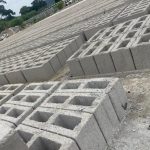 Building blocks stacked in layers on the ground