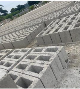 Building blocks stacked in layers on the ground