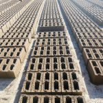 Long rows of building blocks stacked on the ground