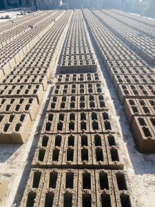 Long rows of building blocks stacked on the ground