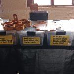 A table holding a large selection of dried meat which included wors and biltong for sale at the Ifafa Beach Fun Day charity flea market on 28 Sep 2024