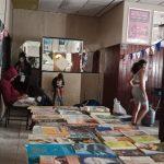 Tables holding a large variety of books at the Ifafa Beach Fun Day charity flea market on 28 Sep 2024